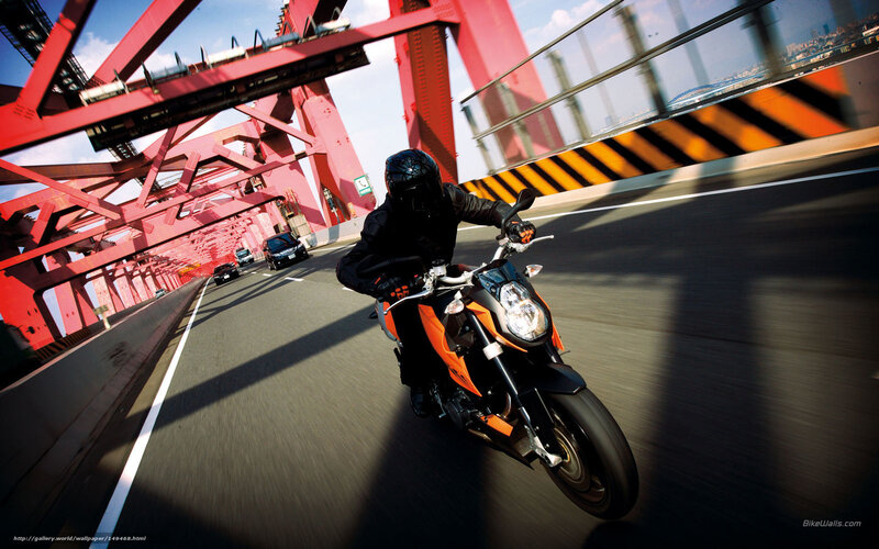 Motorcyclist on Bridge — Orange