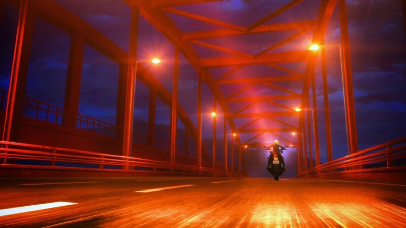 Motorcyclist on Bridge — Red