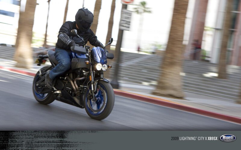 Motorcyclist on City Street — Blue, Dynamic, Afternoon, Photograph, Motorcycle
