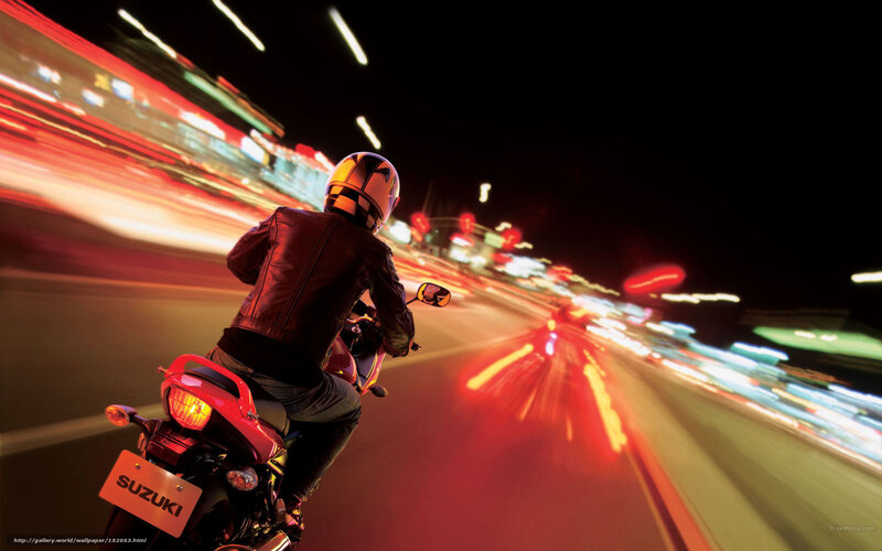 Motorcyclist on City Street — Red