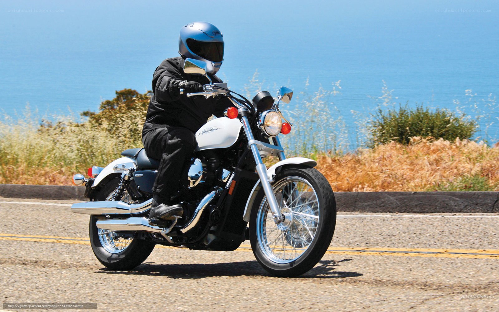 motorcyclist on coastal road