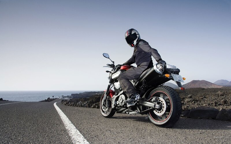 Motorcyclist on coastal road