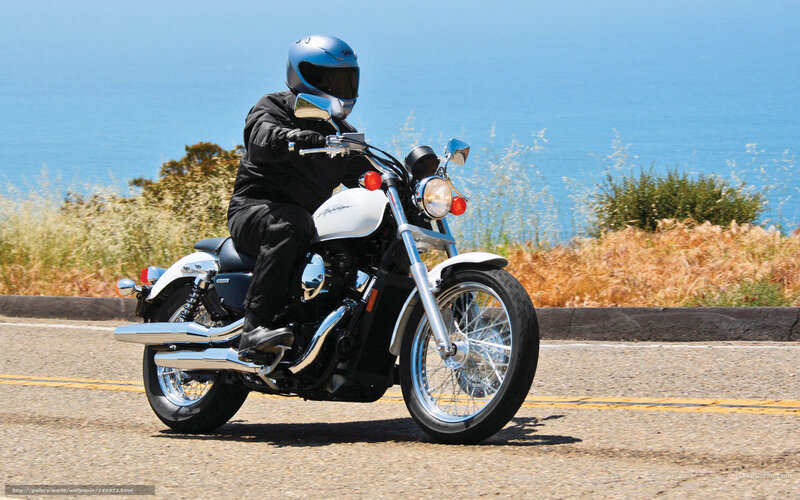 Motorcyclist on Coastal Road — Blue, Serene, Afternoon, Photograph, Ocean