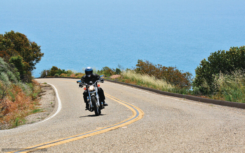 Motorcyclist on Coastal Road — Blue, Serene