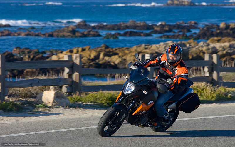 Motorcyclist on Coastal Road — Blue