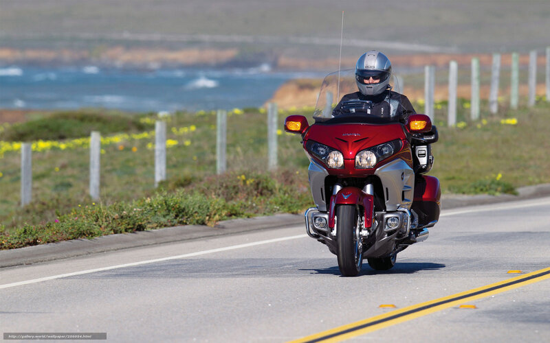 Motorcyclist on Coastal Road — Red, Serene