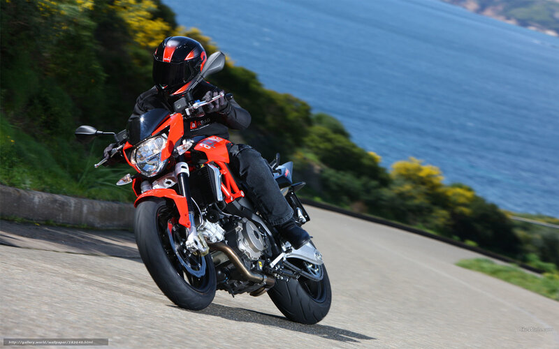 Motorcyclist on Coastal Road — Red