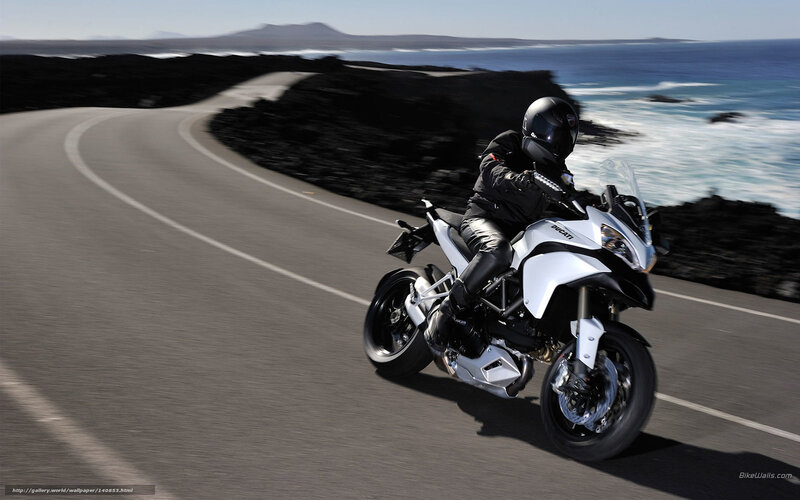 Motorcyclist on Coastal Road — White