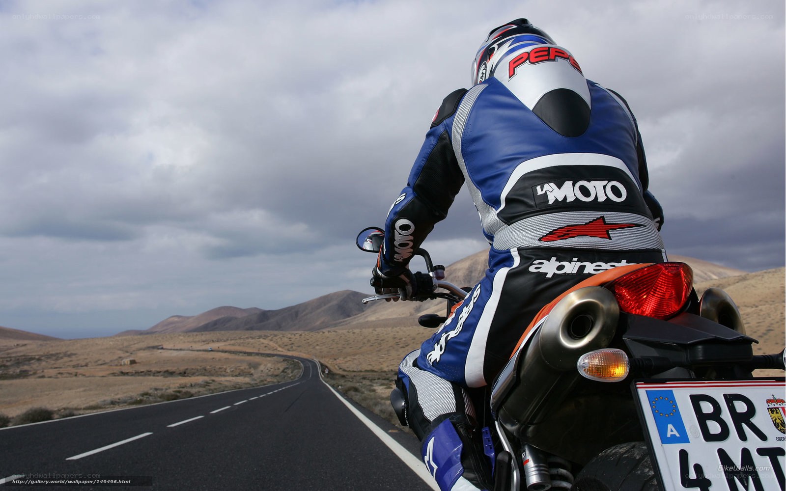 Motorcyclist on desert road