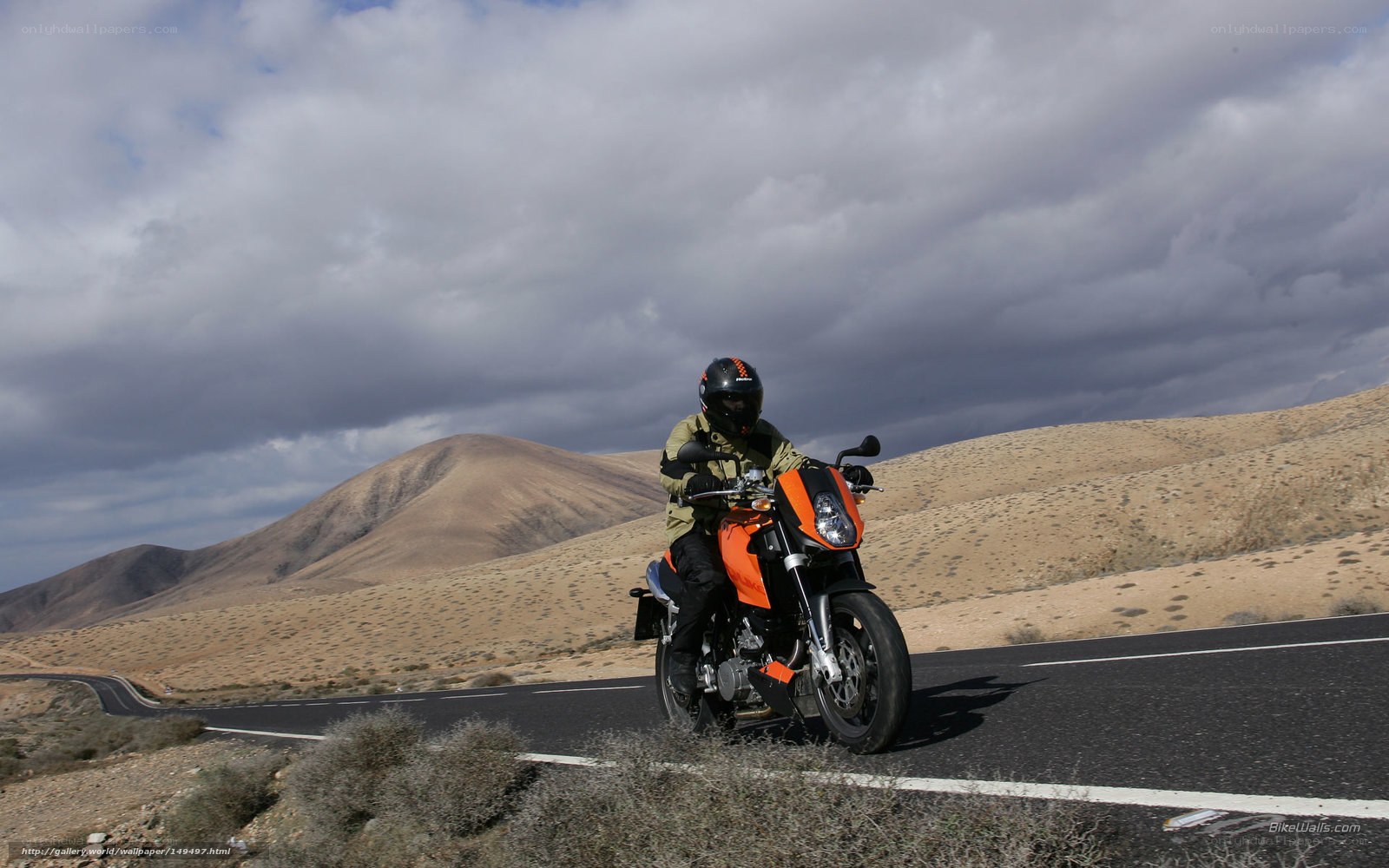 Motorcyclist on desert road