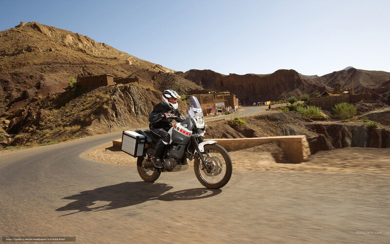 Motorcyclist on Desert Road — Brown, Arid