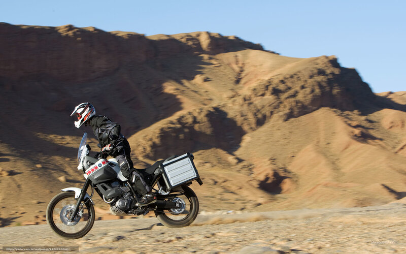 Motorcyclist on Desert Road — Brown, Dramatic, Afternoon