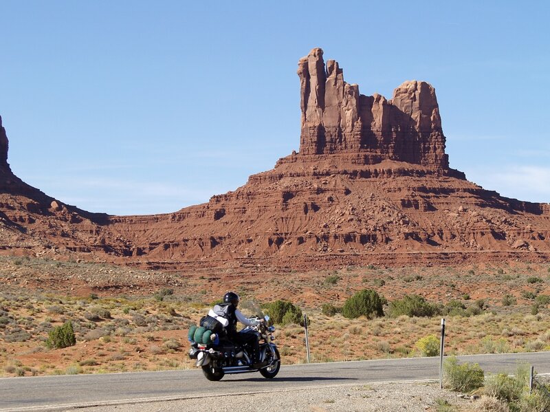 Motorcyclist on Desert Road — Red