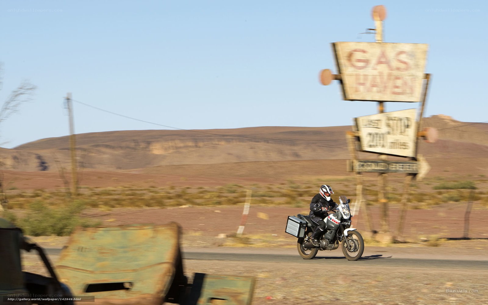 motorcyclist on desert road