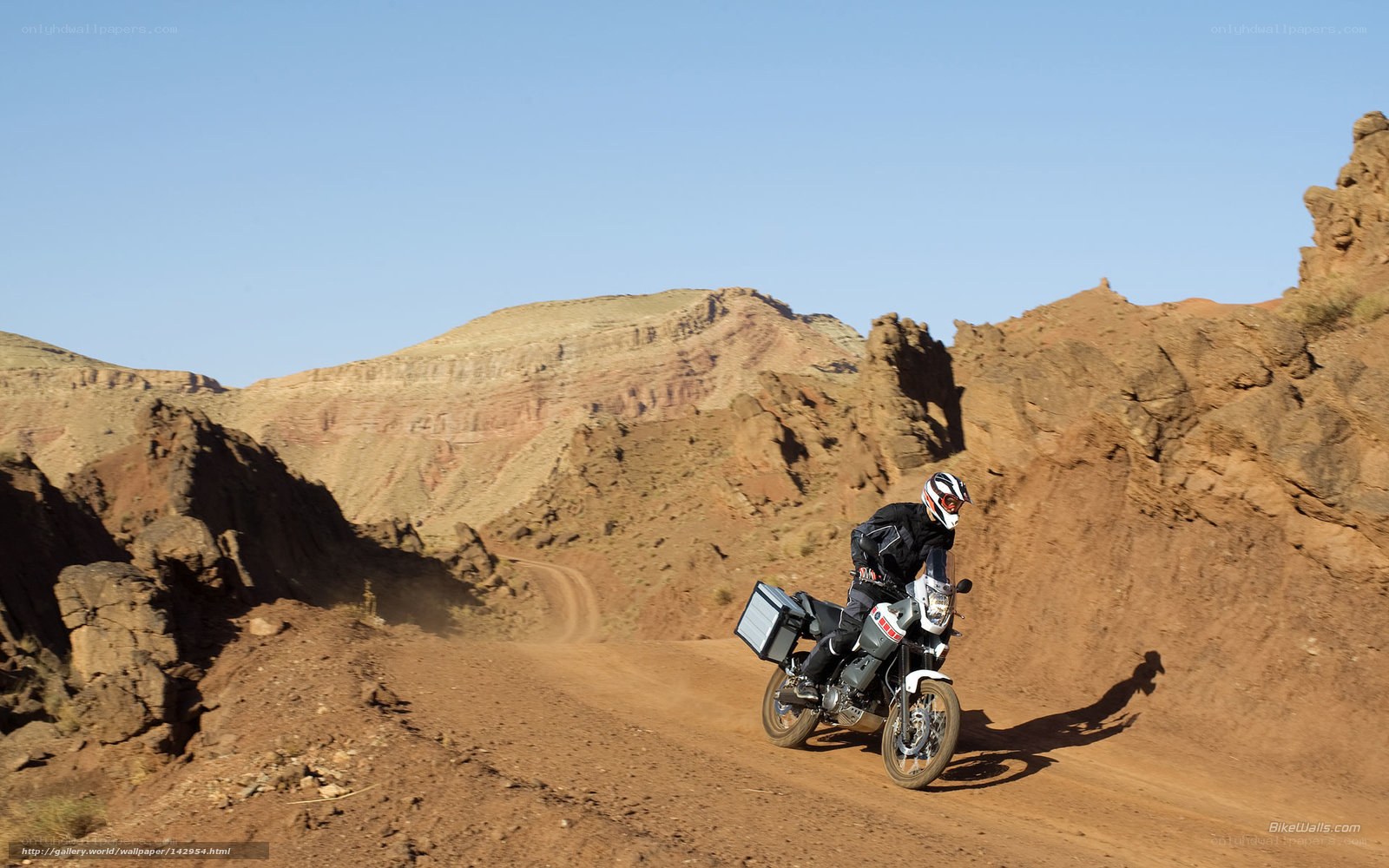 Motorcyclist on desert trail