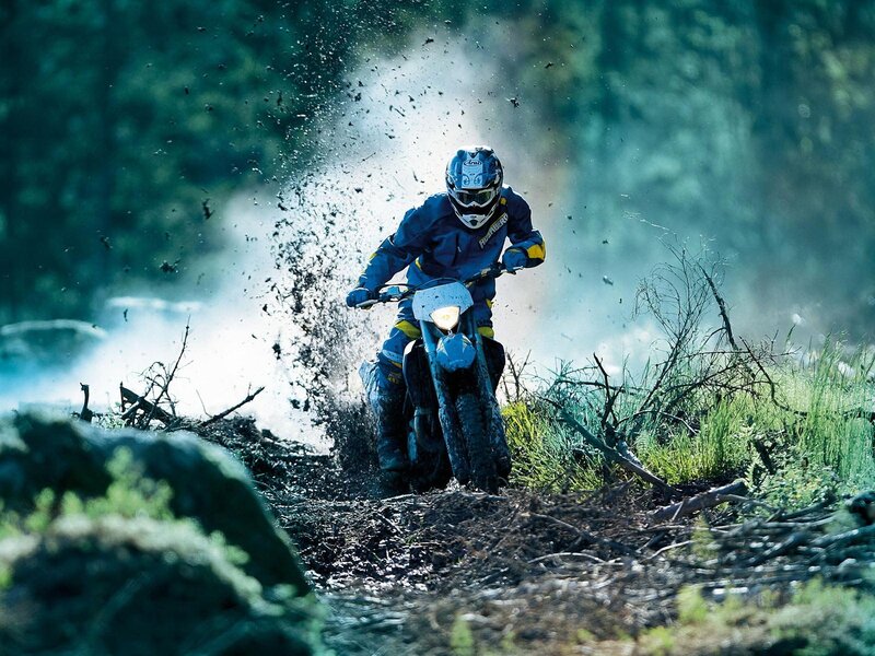 Motorcyclist on Dirt Bike — Blue, Dynamic, Afternoon, Photograph, Mud, Forest, Helmet