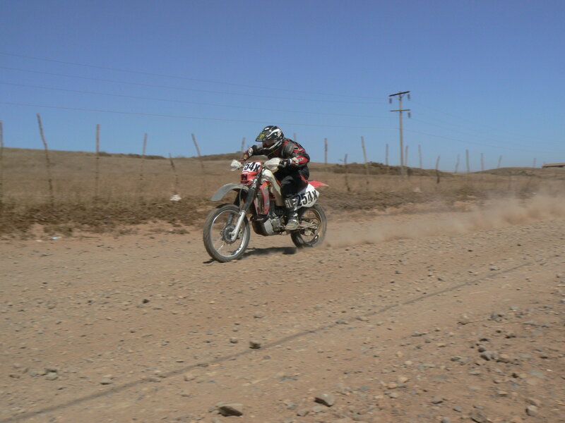 Motorcyclist on Dirt Bike — Brown, Active, Afternoon, Photograph