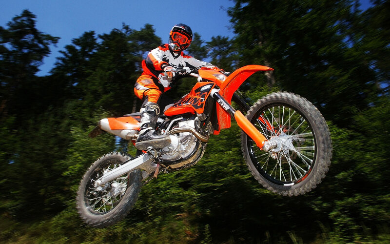 Motorcyclist on Dirt Bike — Orange