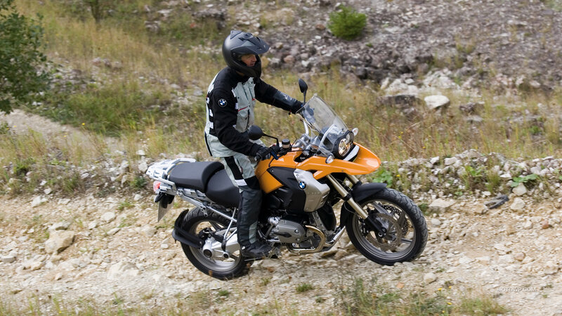 Motorcyclist on Dirt Path — Orange, Outdoor