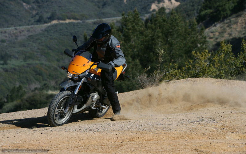 Motorcyclist on Dirt Path — Orange