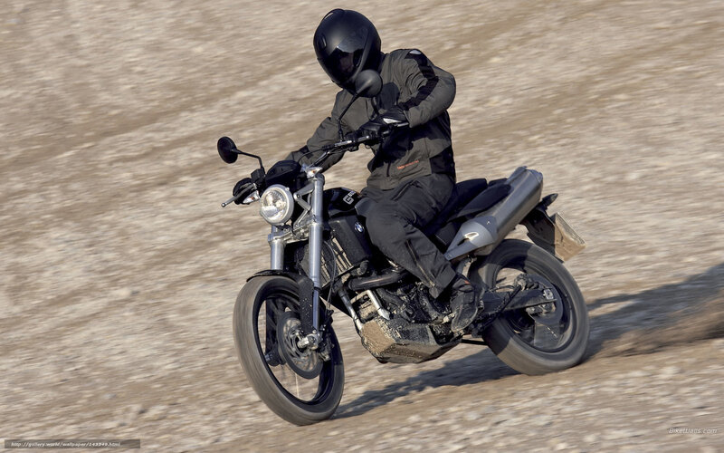 motorcyclist on dirt road