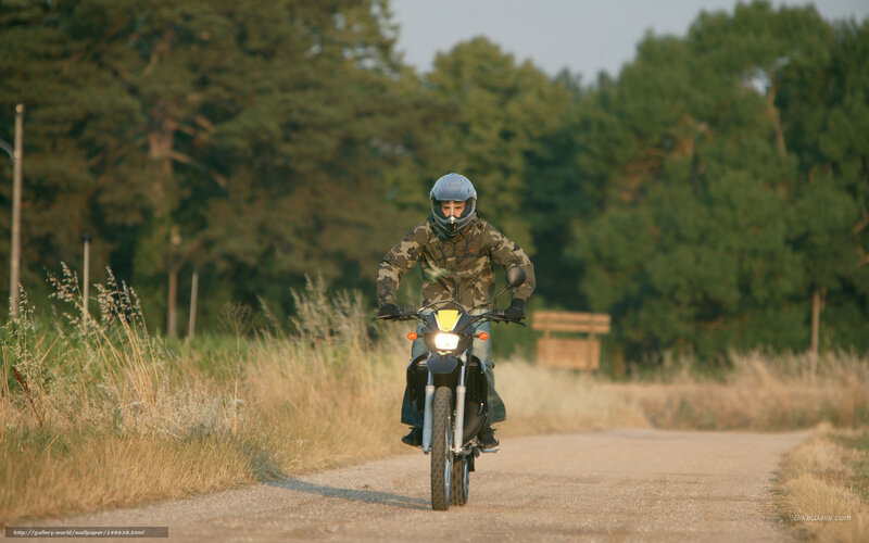 Motorcyclist on Dirt Road — Green