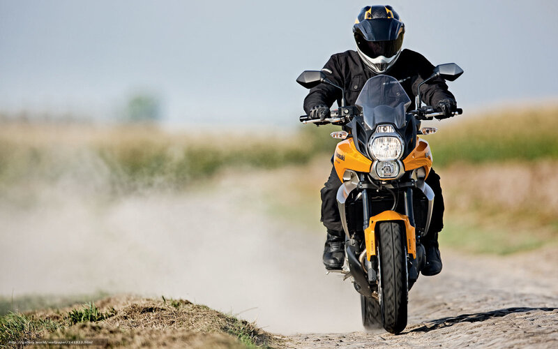 Motorcyclist on Dirt Road — Yellow