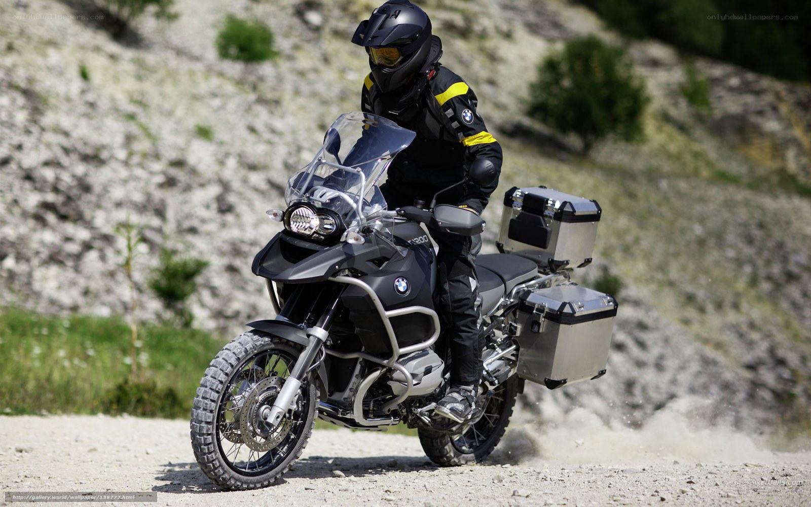 motorcyclist on dirt road