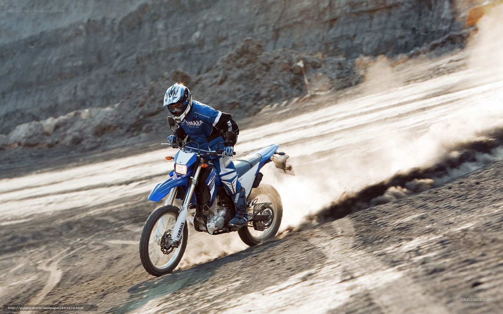 Motorcyclist on dirt track