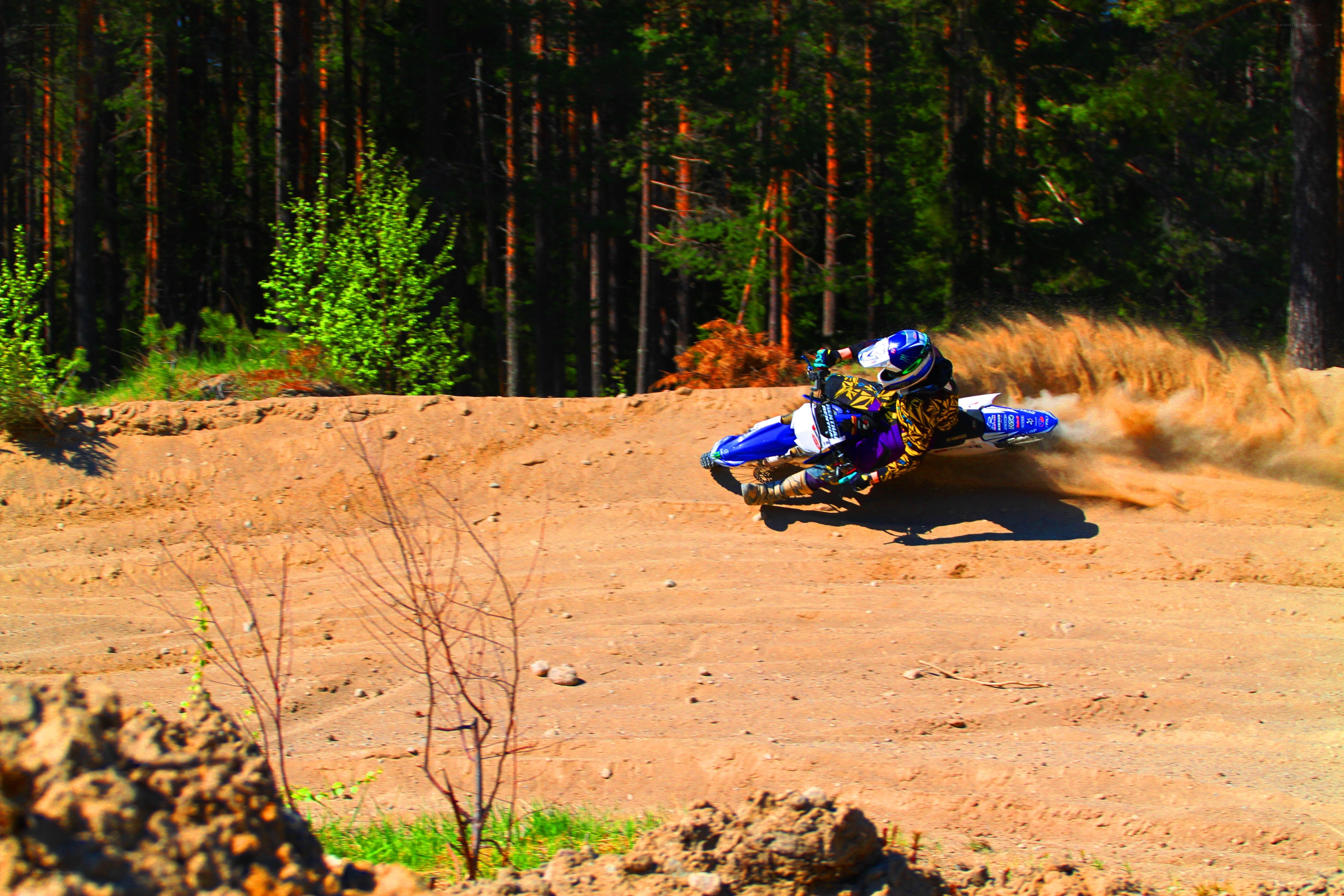 Motorcyclist on dirt track