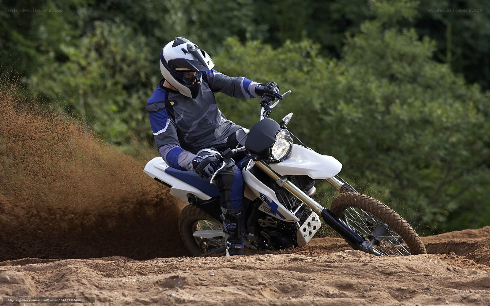 Motorcyclist on dirt track