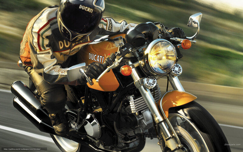 Motorcyclist on Ducati — Orange