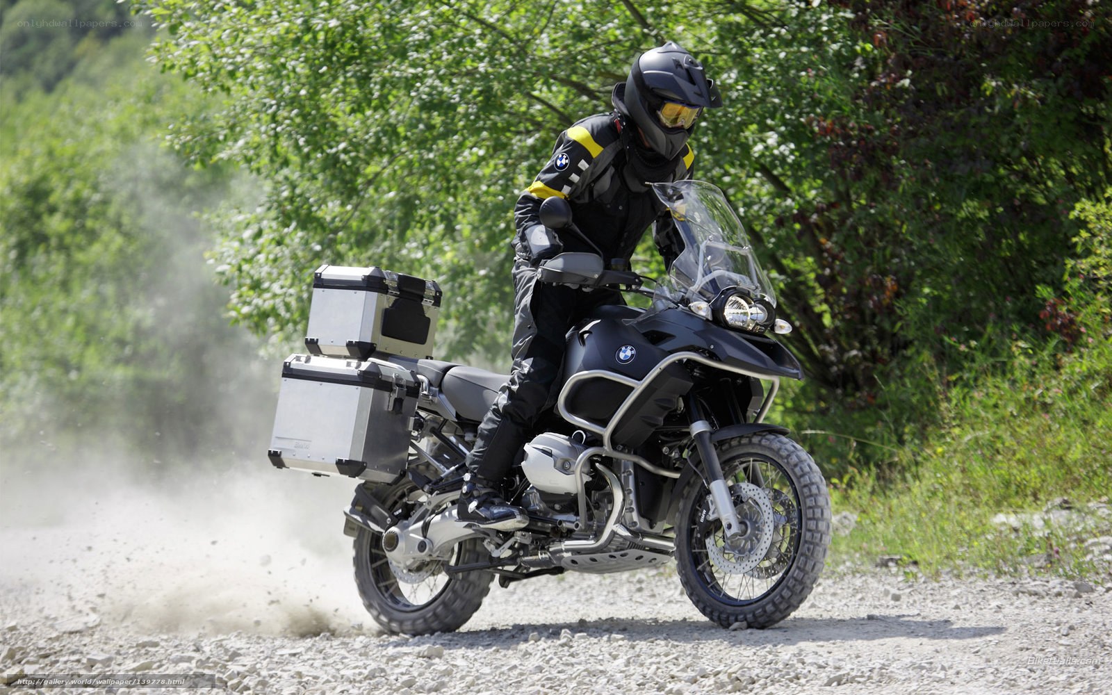 motorcyclist on gravel path