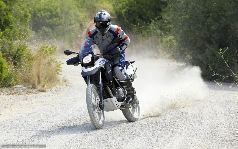 motorcyclist on gravel road