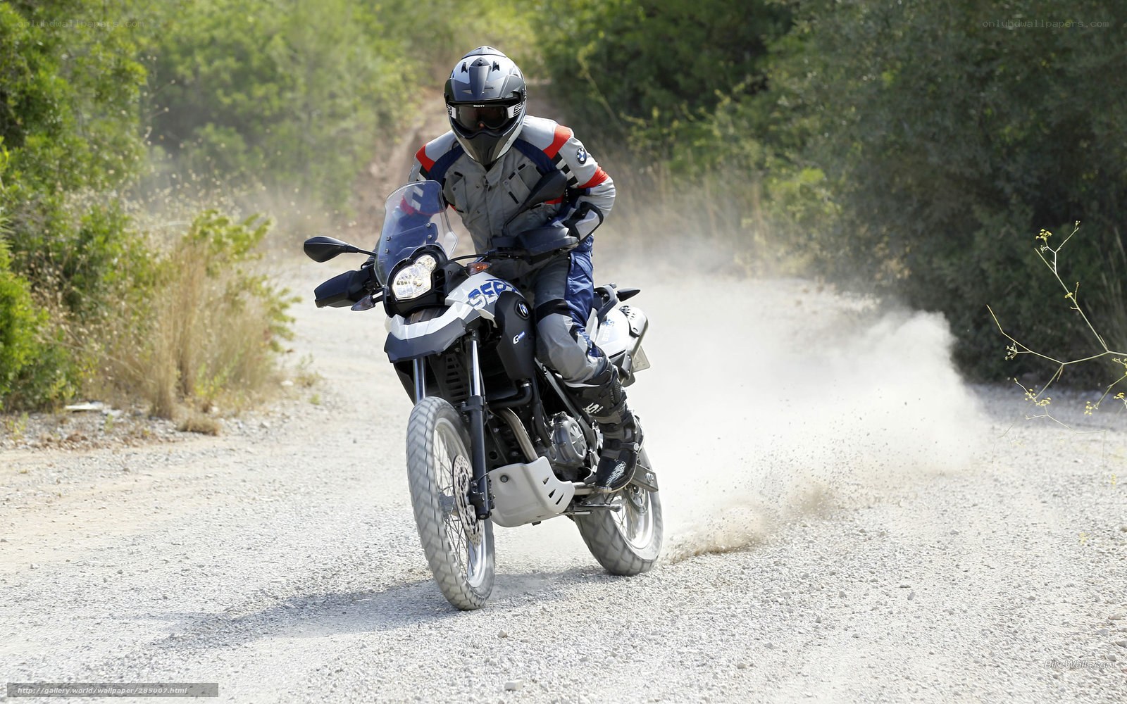 motorcyclist on gravel road