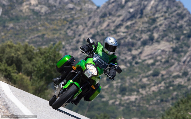Motorcyclist on Green Bike — Dynamic, Afternoon, Photograph, Mountain