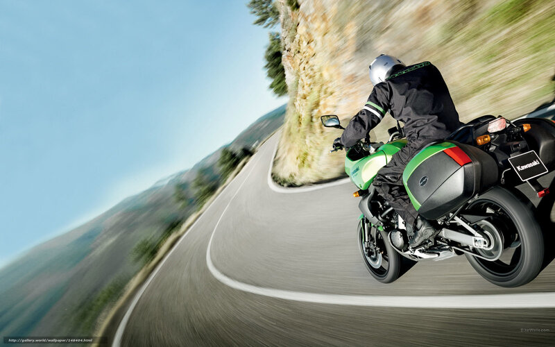 Motorcyclist on Green Bike — Dynamic, Afternoon, Photograph, Road, Helmet