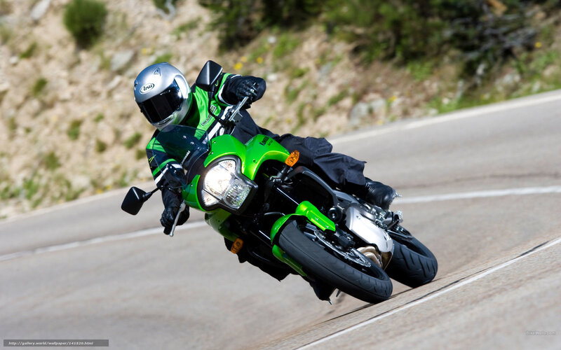 Motorcyclist on Green Bike — Dynamic
