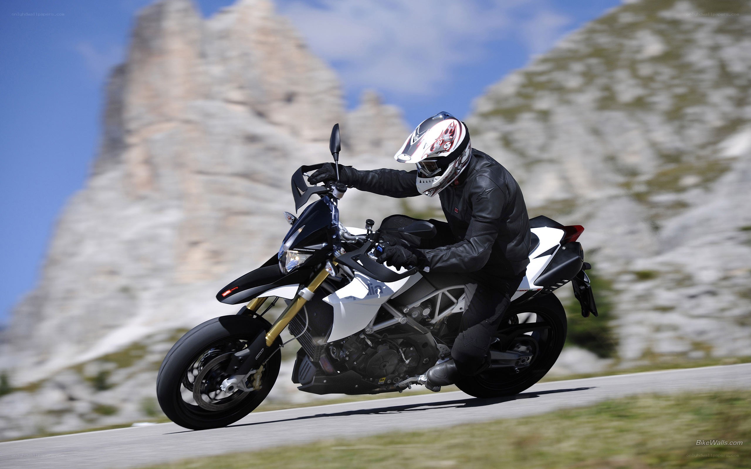 motorcyclist on mountain road