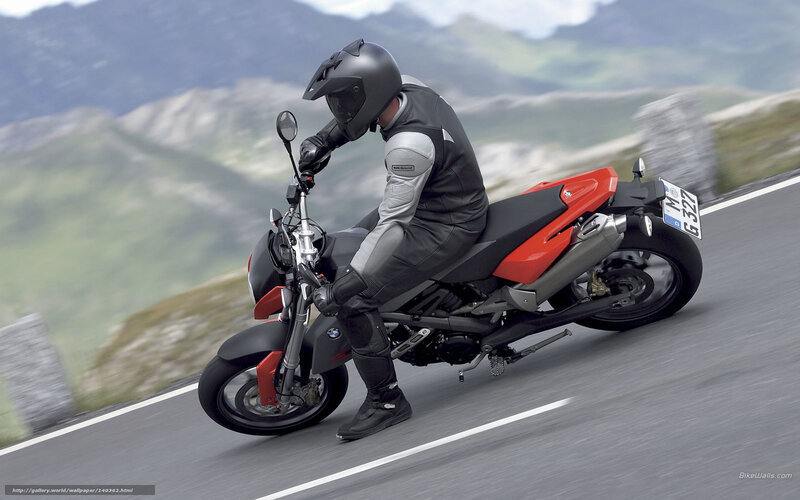 motorcyclist on mountain road