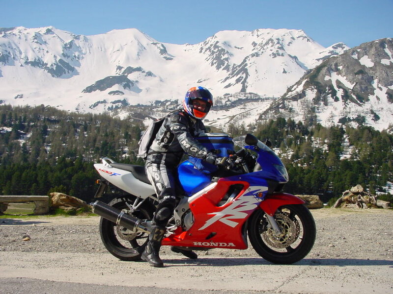Motorcyclist on Mountain Road — Blue
