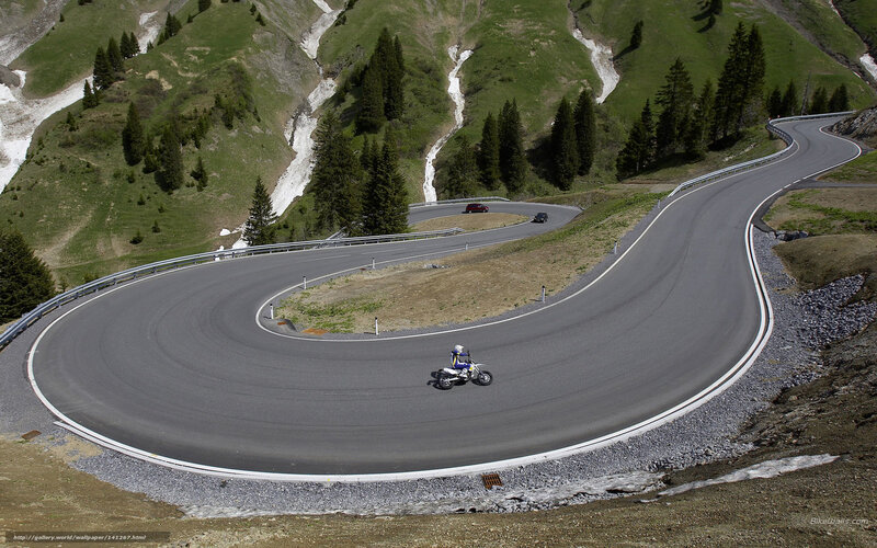 Motorcyclist on Mountain Road — Green, Serene