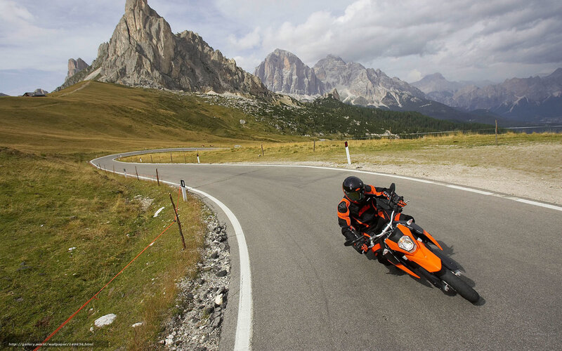 Motorcyclist on Mountain Road — Orange, Dramatic, Afternoon