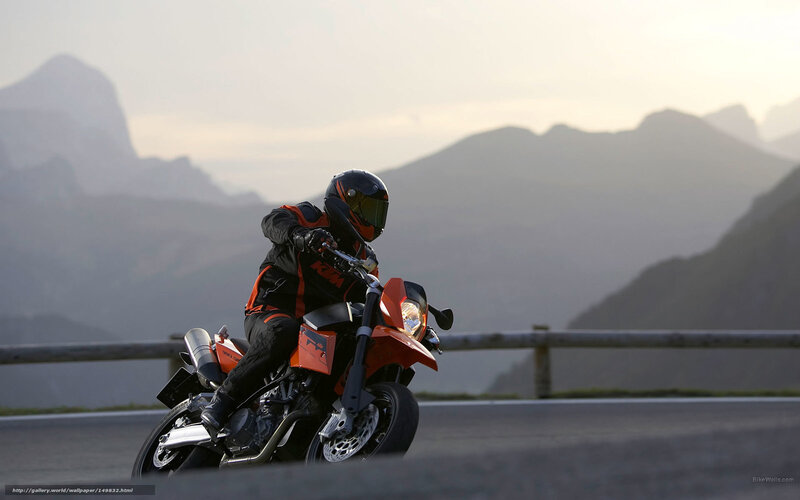 Motorcyclist on Mountain Road — Orange, Dramatic