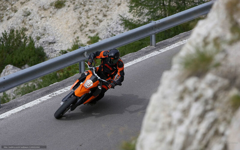 Motorcyclist on Mountain Road — Orange, Dynamic, Afternoon