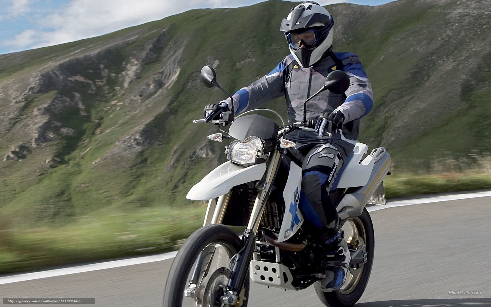 motorcyclist on mountain road