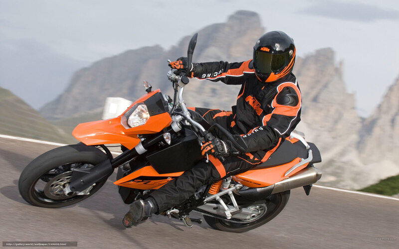motorcyclist on orange bike