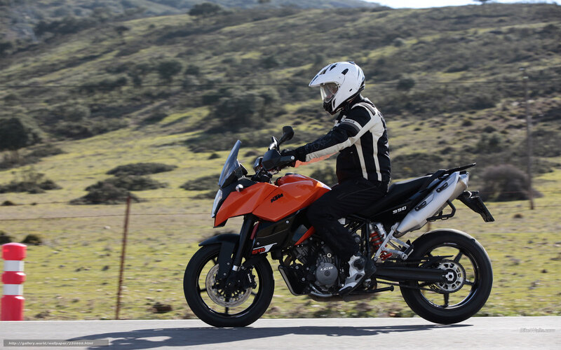 Motorcyclist on Orange Bike — Active, Afternoon