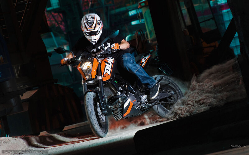 Motorcyclist on Orange Bike — Dramatic, Photograph