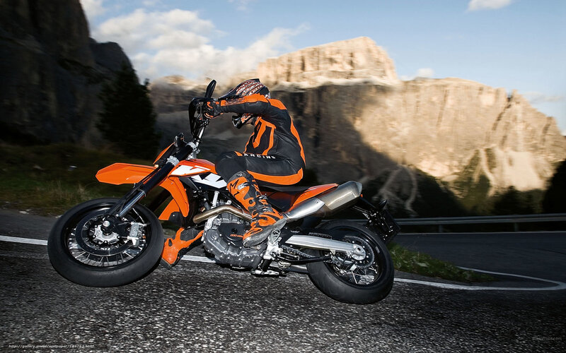 Motorcyclist on Orange Bike — Dynamic, Afternoon, Photograph, Mountain